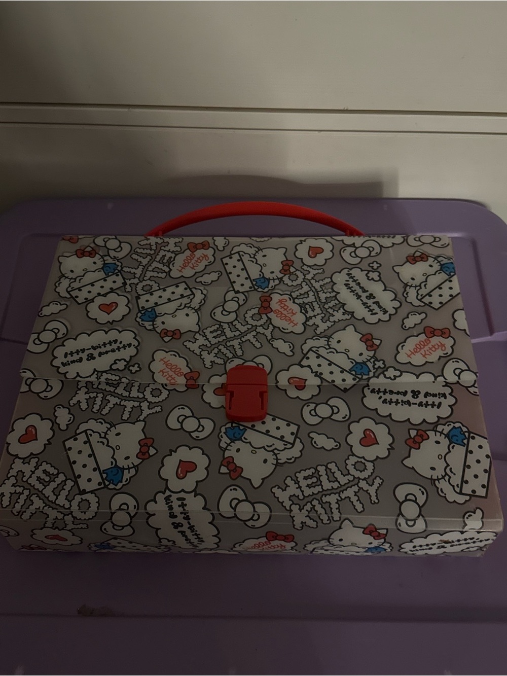 Hello Kitty Purple Patterned Carry Case with Red Clasp and Pink Handle